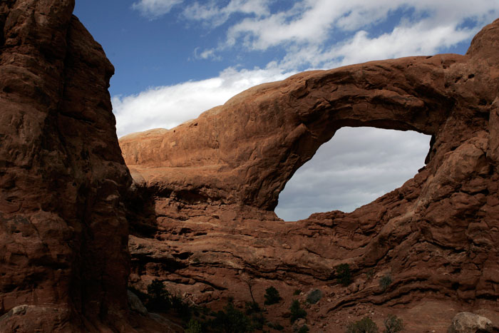 Canon EOS 1D MarkII — 24mm ISO 100 @ f/5.6 and 1/1000 sec — An arch in Arches National Park.
