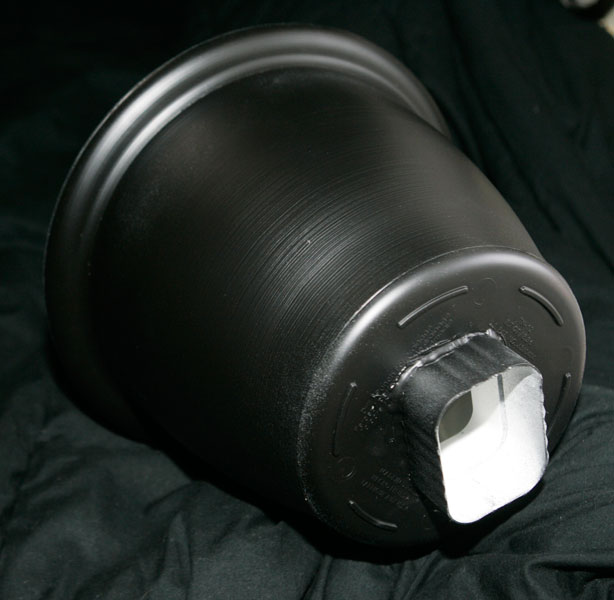 A rear view showing the mount for the Speedlight and also the depth of the dish.