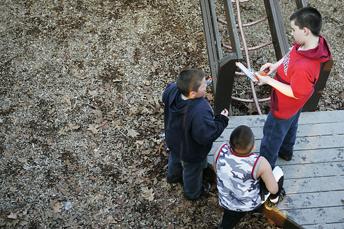 Kids load their airsoft guns on the playground in Baker Park. (C-T photo Max Gersh) ©2010