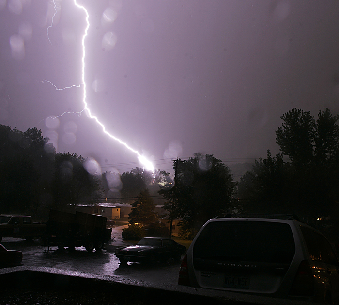 A lightning bolt strikes the ground in rural St. Louis while the area is under a tornado warning. ©2010 Max Gersh