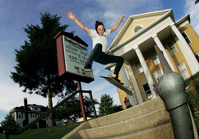 Ethan Jester does a kickflip down a set of steps in front of Fashion Trends Consignment Shop in New Castle Wednesday evening. (C-T photo Max Gersh) ©2010