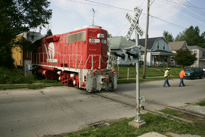 A train engine blocks part of A Avenue Friday morning as it connects with train cars that have been stored on New Castle tracks for over two years. (C-T photo Max Gersh) ©2010