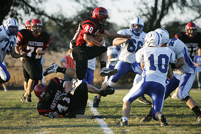 Knightstown's Danny Ortman hurdles a teammate during a drive against the Eastern Hancock Royals. Ortman was one of two Knightstown rushers to earm more than 100 yards on the ground. (C-T photo Max Gersh) ©2010