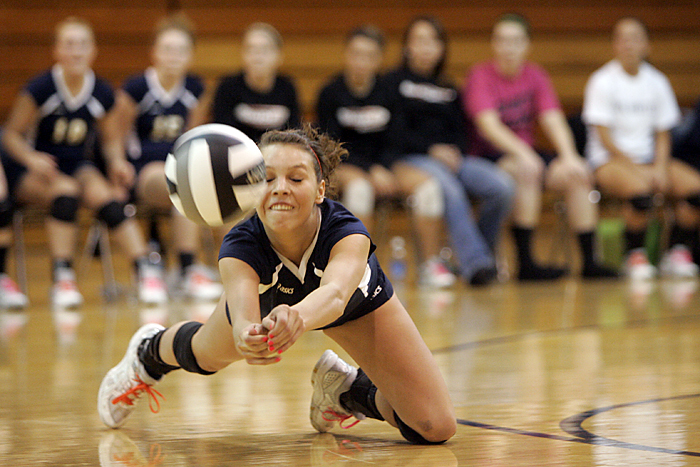 Makayla Roseberry of Shenandoah dives for the ball Tuesday night during the regional match against Muncie Burris. (C-T photo Max Gersh) ©2010