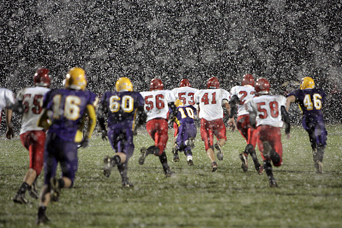 Knightstown (white) and Hagerstown players run downfield during the first half of play Friday night. (C-T photo Max Gersh) ©2010