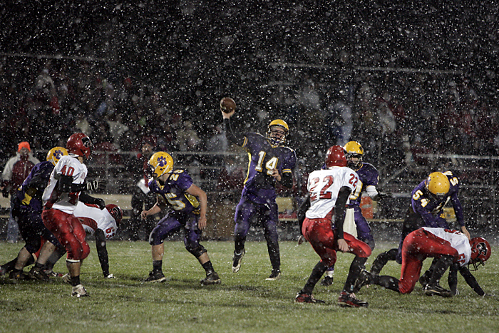 Hagerstown quarterback Alex Houck throws a pass Friday night during the sectional championship game against Knightstown. (C-T photo Max Gersh) ©2010
