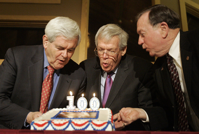 MAX GERSH | ROCKOFRD REGISTER STAR Former Speakers of the House Newt Gingrich (left) and Dennis Hastert and State Rep. Jerry Mitchell blow out the candles on a cake Friday, Feb. 4, 2011, for President Ronald Reagan's 100th birthday celebration at Deer Valley Golf Club in Deer Grove. ©2011