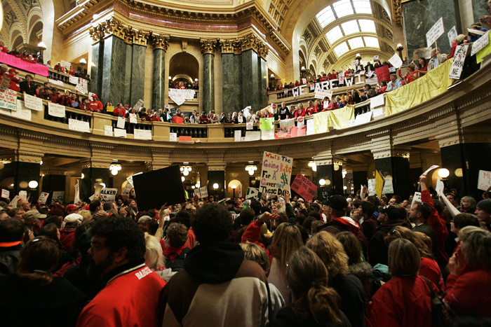 MAX GERSH | ROCKFORD REGISTER STAR  People fill the State Capitol Friday, Feb. 18, 2011, in Madison, Wis., to protest Gov. Scott Walker's bill to eliminate collective bargaining rights for state workers. ©2011