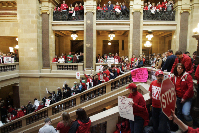 MAX GERSH | ROCKFORD REGISTER STAR  People fill the state Capitol Friday, Feb. 18, 2011, in Madison, Wis., to protest Gov. Scott Walker's bill to eliminate collective bargaining rights for state workers. ©2011