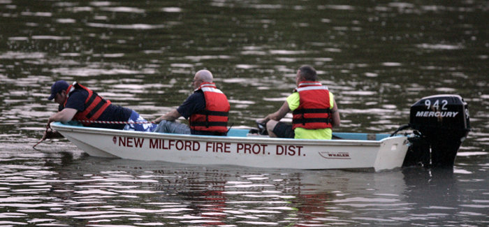 MAX GERSH | ROCKFORD REGISTER STAR Emergency responders from the New Milford Fire Protection District search the Rock River Saturday, June 4, 2011, after a call came in for a river rescue near Silver Creek Road in southern Winnebago County. ©2011