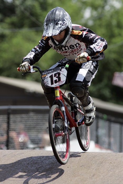 MAX GERSH | ROCKFORD REGISTER STAR Erik Meyer,12, of Libertyville, Ill., comes down over a hill Thursday, June 16, 2011, during practice runs for the ABA BMX Midwest Nationals at Searls Park in Rockford. ©2011