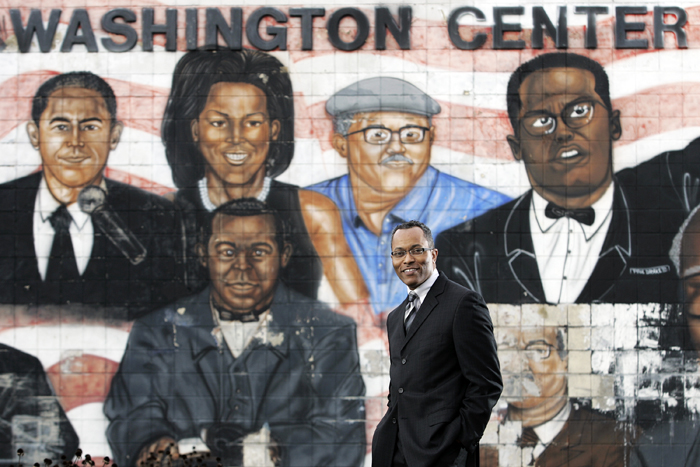 MAX GERSH | ROCKFORD REGISTER STAR Booker Washington Community Center board president Robert King stands near a mural on the south side of the facility Thursday, Oct. 13, 2011, in Rockford. King says he wants to put a new mural up in its place within the coming year. "I love the past but I want to bring the simplicity back to the center and bring it back to Booker Washington himself," King said. © 2011