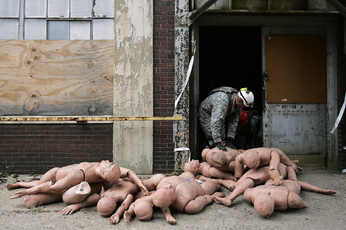 MAX GERSH | ROCKFORD REGISTER STAR National Guardsmen pile dummies outside of a door Wednesday, Nov. 2, 2011, at the Barber Colman complex in Rockford. The National Guard and Rockford Fire Department were training in the building to simulate a rescue scenario in a tornado damaged structure.